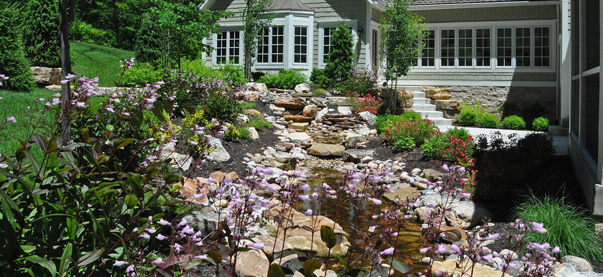 Backyard area with pond.