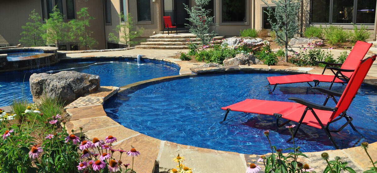 In-ground pool in backyard area.