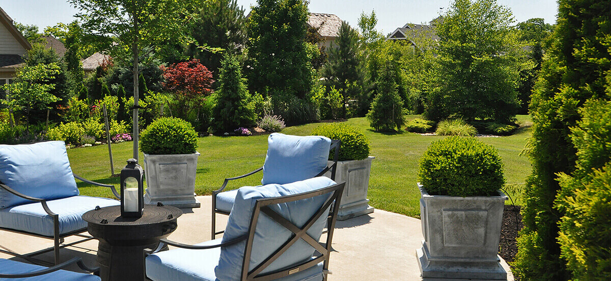 Outdoor area and landscape design with sitting arrangement.