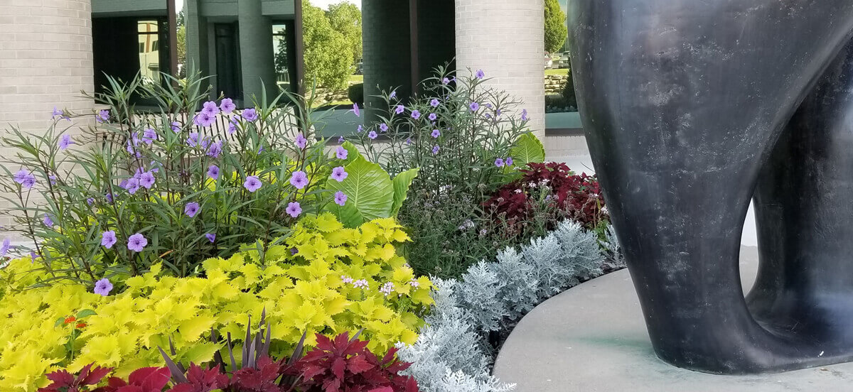 Landscape design with flowers, completed by Embassy Landscape Group.